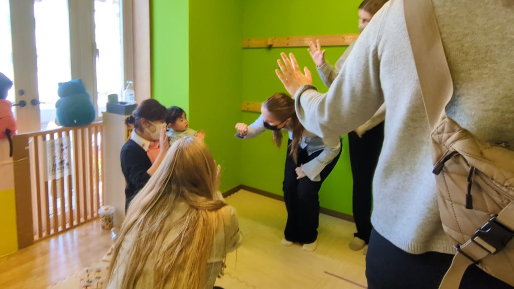 Students from Denmark interact with children at A-Cube